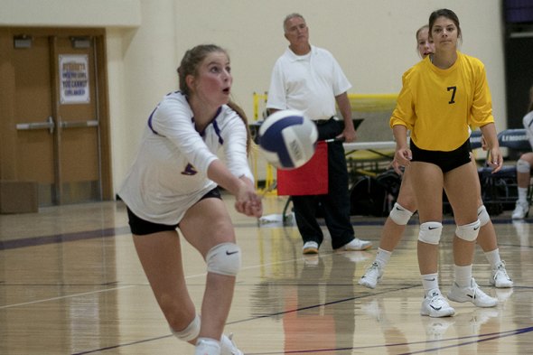 Lemoore's Shelby Saporetti goes for the save in Tuesday's loss to Redwood in the Lemoore High School Event Center.